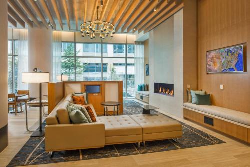 a living room with a couch and a fireplace at Residence Inn by Marriott Baltimore at The Johns Hopkins Medical Campus in Baltimore