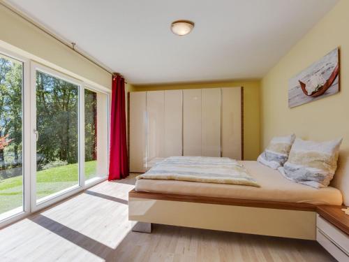 Postel nebo postele na pokoji v ubytování Apartment in Kaprun near Ski Slopes