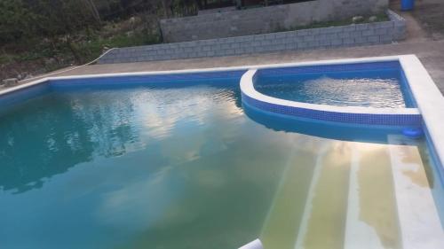 Bazén v ubytování Rancho típico la gravilla nebo v jeho okolí