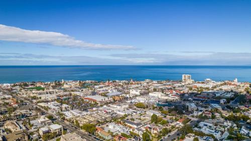 an aerial view of a city next to the ocean at Coastal La Jolla Luxury - AC & Large Ocean View Patio! in San Diego