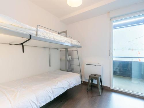 Bunk bed o mga bunk bed sa kuwarto sa Appartement Peyragudes, 5 pièces, 8 personnes - FR-1-695-45