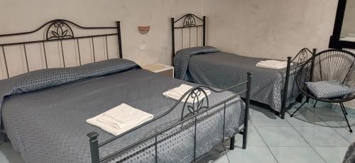 Cama o camas de una habitación en Il Casadduoglio mare e monti
