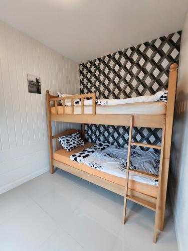 a couple of bunk beds in a room at Cordelia Resort Sam Roi Yot in Sam Roi Yot