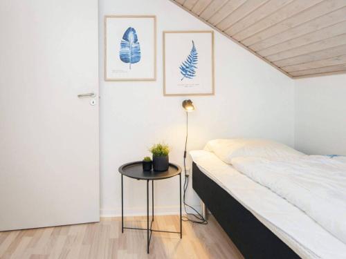 Voodi või voodid majutusasutuse Holiday home Rømø XV toas