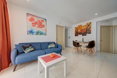 Un lugar para sentarse en Sapphire Residences - Apartments & Penthouse In Central Sliema By Shortletsmalta