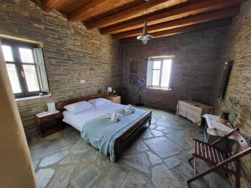 Ένα ή περισσότερα κρεβάτια σε δωμάτιο στο The Stone Lookout Villa