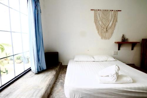 Postel nebo postele na pokoji v ubytování Lana Land Homestay Phu Quoc