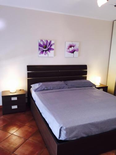Appartamento Giada tesisinde bir odada yatak veya yataklar