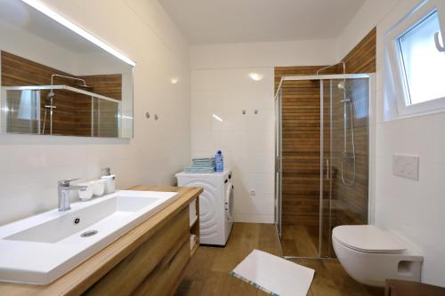 Kúpeľňa v ubytovaní Aqua Cabana