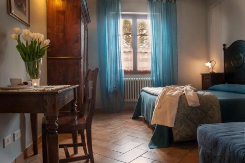 Postel nebo postele na pokoji v ubytování Agriturismo Locanda Pantanello