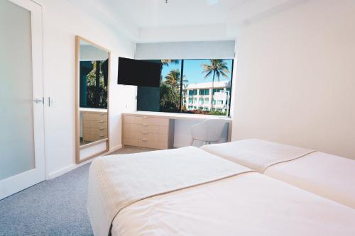 Postel nebo postele na pokoji v ubytování Sheraton Grand Mirage Resort Gold Coast