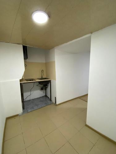 an empty room with a sink and white walls at дом в старом тбилиси in Tbilisi City