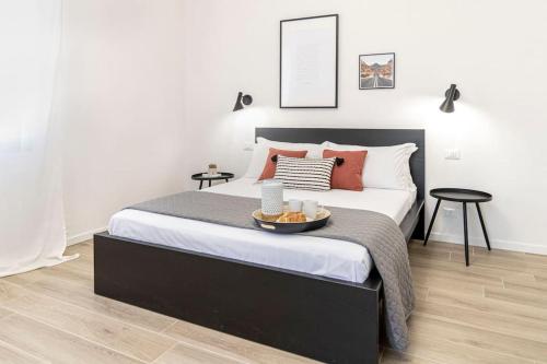 Ένα ή περισσότερα κρεβάτια σε δωμάτιο στο 2Venezia Apartment