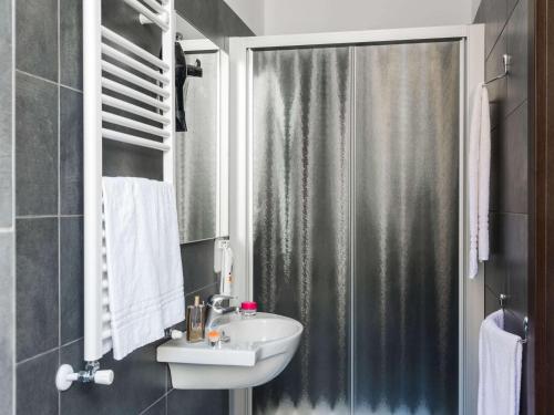 a bathroom with a sink and a shower at Ibis Styles Milano Centro in Milan