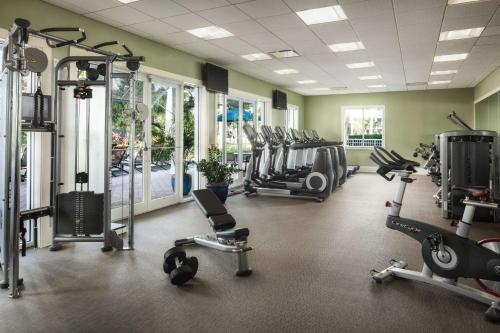 a gym with several treadmills and cardio machines at Hyatt Vacation Club at Coconut Cove in Bonita Shores