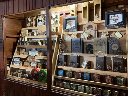 a store display of clocks and other items on shelves at Sarajevski Begluk in Sarajevo