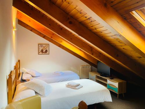 Postel nebo postele na pokoji v ubytování Casa Martagón - kasasbenas