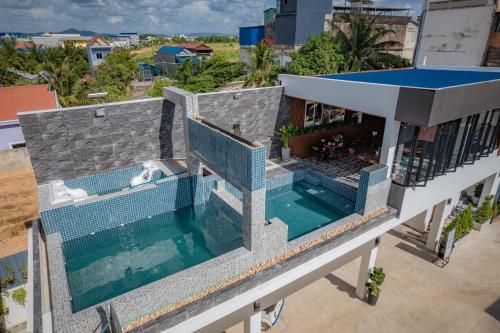 an overhead view of a house with a swimming pool at A&J Kampot Boutique in Kampot