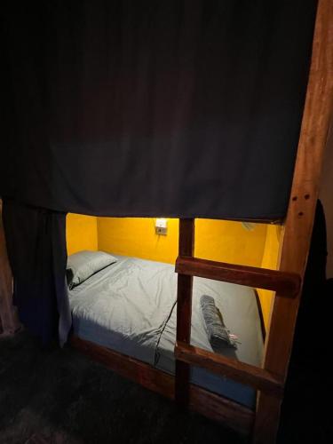 a bunk bed in a room with at SASY Dorm in Santa Catalina