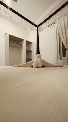 Postel nebo postele na pokoji v ubytování House of Balance