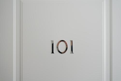 an elevator door with the number on it at Duomo Guest House - Stay in Sorrento in Sorrento