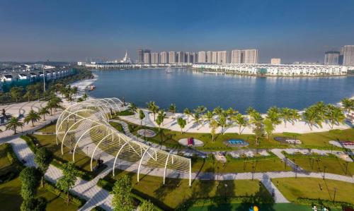 an aerial view of a park next to a body of water at Meii House - Vinhome Ocean Park S201 in Hanoi