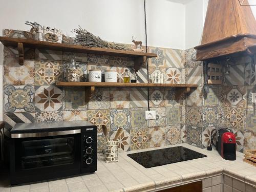 Cucina o angolo cottura di Baita delle Rocche