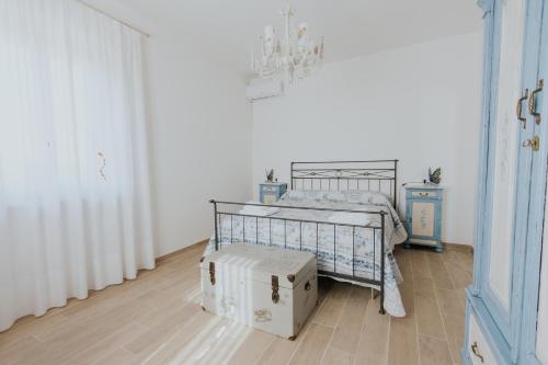Ένα ή περισσότερα κρεβάτια σε δωμάτιο στο La Tana dei Tassi