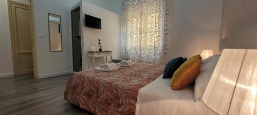 Cama o camas de una habitación en B&B A Modo Mio