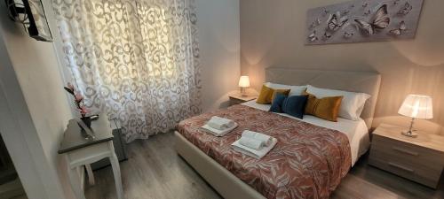 Cama o camas de una habitación en B&B A Modo Mio