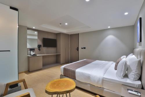 Kuchyň nebo kuchyňský kout v ubytování Hotel Shivashish