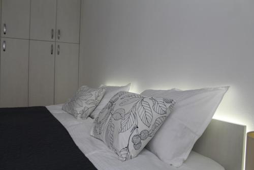 Posteľ alebo postele v izbe v ubytovaní Golden Valley Apartment