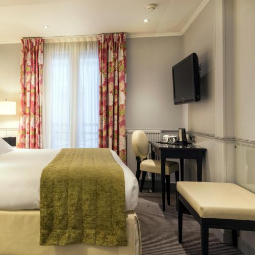 En eller flere senge i et værelse på Hotel Relais Bosquet by Malone