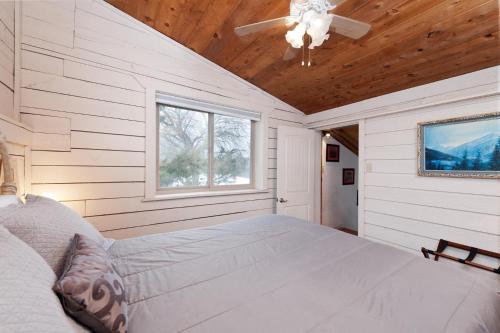 a bedroom with a bed and a ceiling fan at CR 213 - Combo in Durango