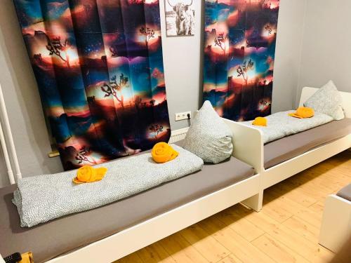 Postel nebo postele na pokoji v ubytování Flensburg Zentrum 50 06