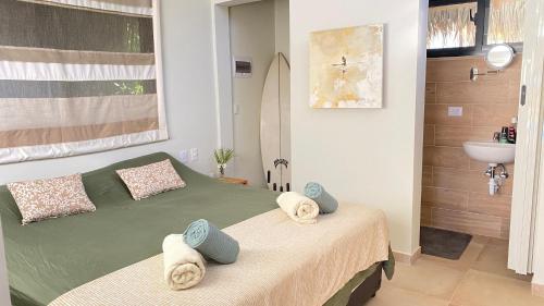 Postel nebo postele na pokoji v ubytování Sfeervolle studio in Encuentro, Cabarete