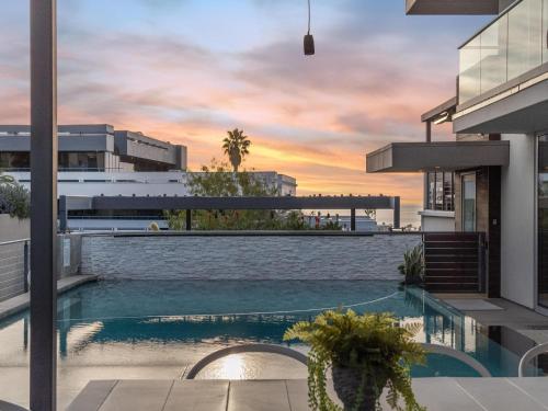 a swimming pool on the roof of a building at Luxury Coastal Home - Pool, Spa, AC, & Ocean Views in Solana Beach