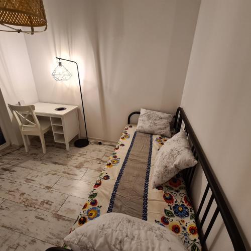 Katil atau katil-katil dalam bilik di Apartament pod Górą Witosza