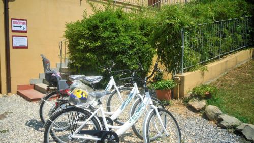 a group of bikes parked next to a building at Corte Tommasi Residence in Orentano