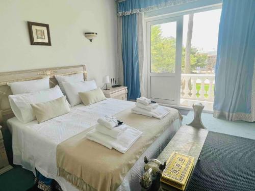 Katil atau katil-katil dalam bilik di Kishni, peaceful and luxury suite villa