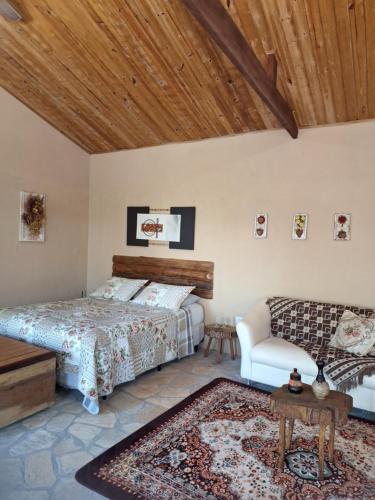 Tempat tidur dalam kamar di Cabana Refúgio da Mata