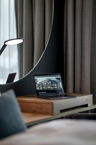 a laptop computer sitting on a table in a room at WITTMANNs in Neumarkt in der Oberpfalz