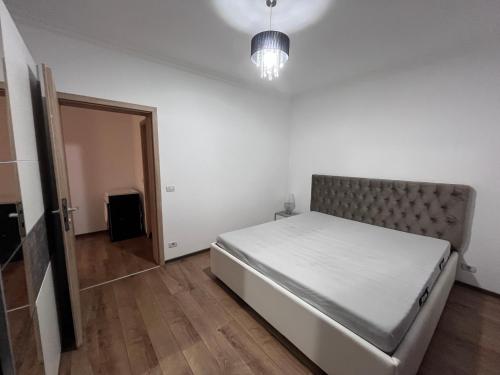 Cama ou camas em um quarto em Apartament