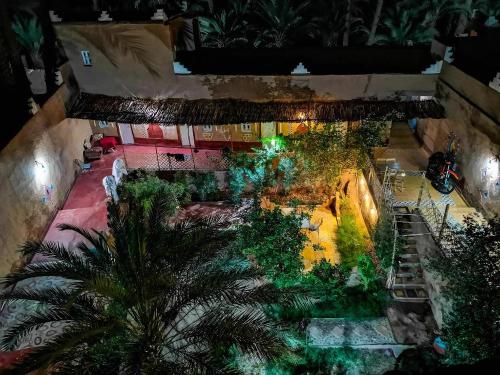 an overhead view of a pool in a resort at Riad Dar Zaouia in Zagora