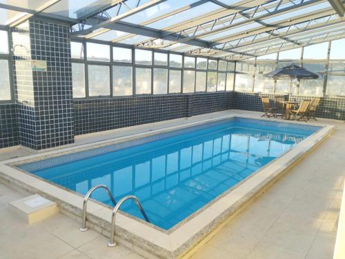 Πισίνα στο ή κοντά στο Aquarius Hotel Flat Residence
