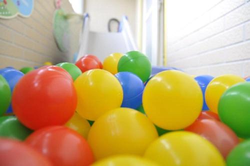 a pile of colorful balloons in a room at D3 Classic BNB in Wujie