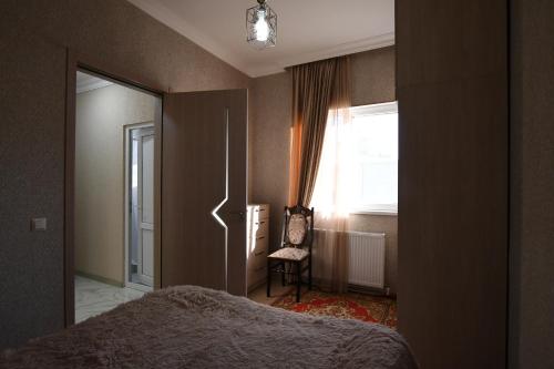 Postel nebo postele na pokoji v ubytování Nika house