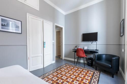TV a/nebo společenská místnost v ubytování casa mo room and suite