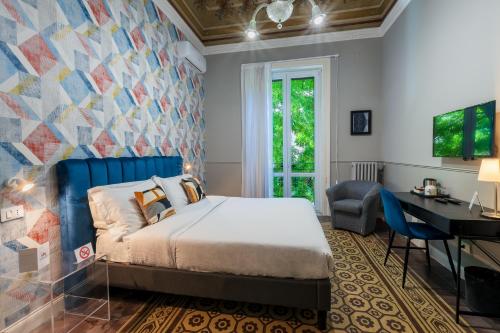 A bed or beds in a room at casa mo room and suite
