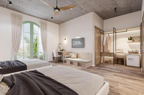 Postel nebo postele na pokoji v ubytování Hoi An Pinus Boutique